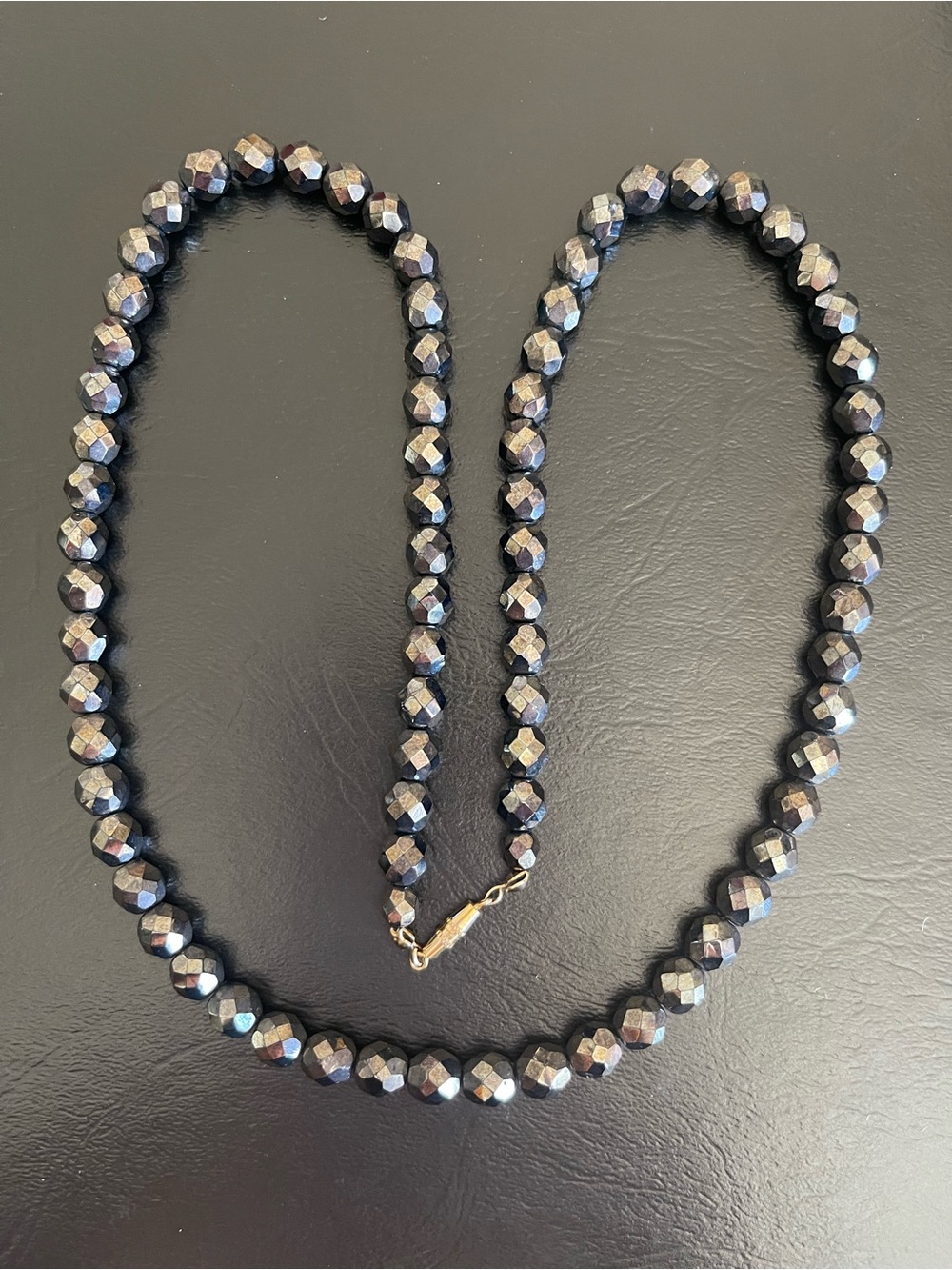 Faceted jet black glass Bead Necklace .